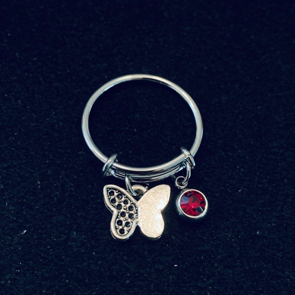 Butterfly themed dangle charm ring with birthstone charm